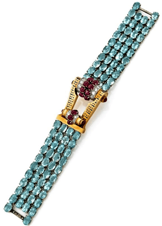 bracelet à 4 rangs d'aigue marine orné au centre d'un motif rectangulaire ajouré en or jaune