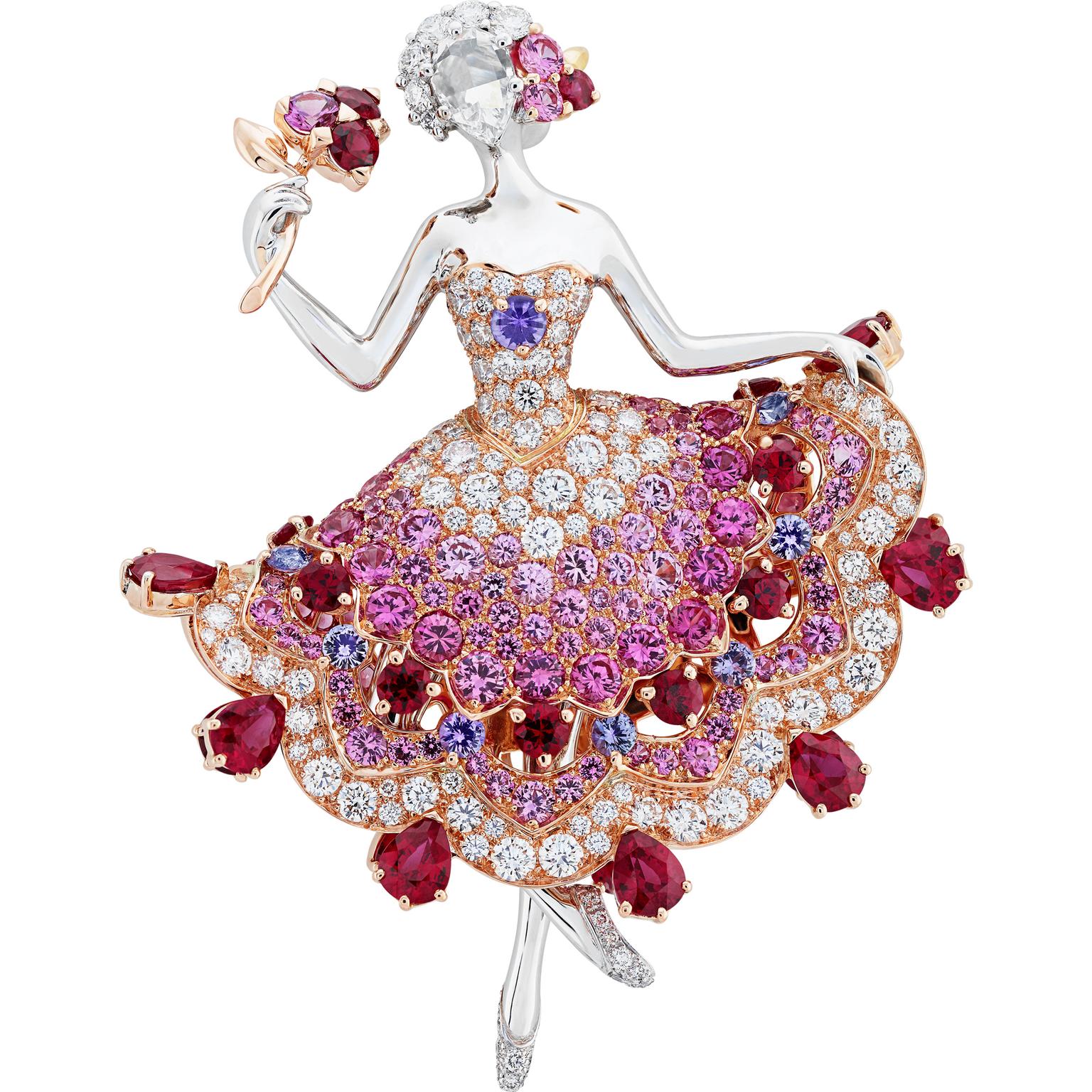 Ballerine VCA portant une robe bouffante serties de saphirs roses, rubis, et diamants tenant un bouquet de fleurs