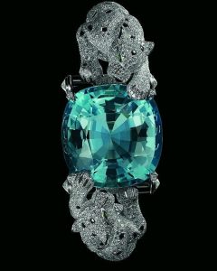 Bracelet cartier en or et diamants serti d'une grosse tourmaline Paraiba