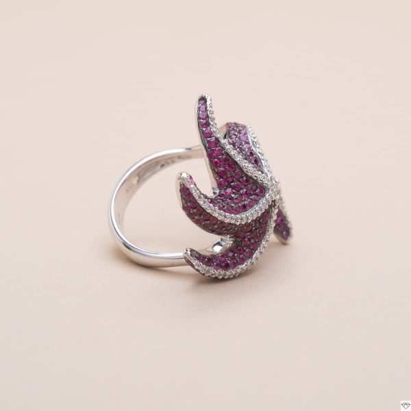 Bague d'occasion étoile sertie en pavage de rubis et de diamants