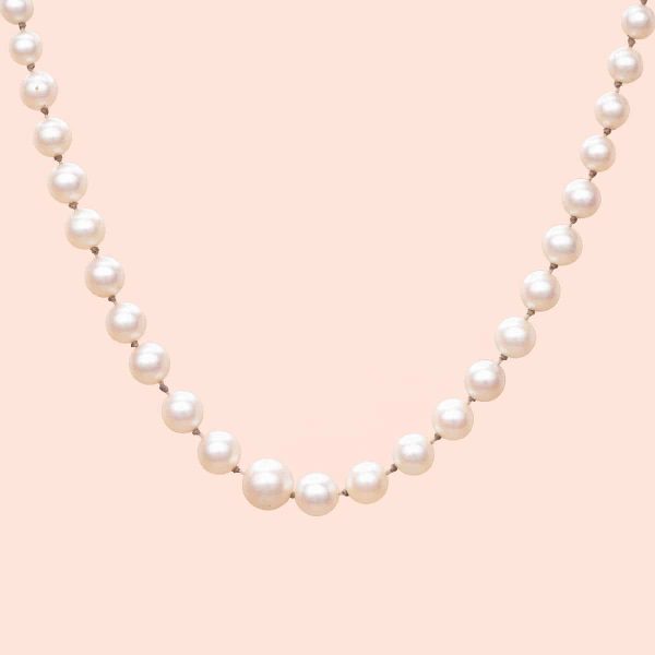 Collier vintage de perles couleur blanc-crème